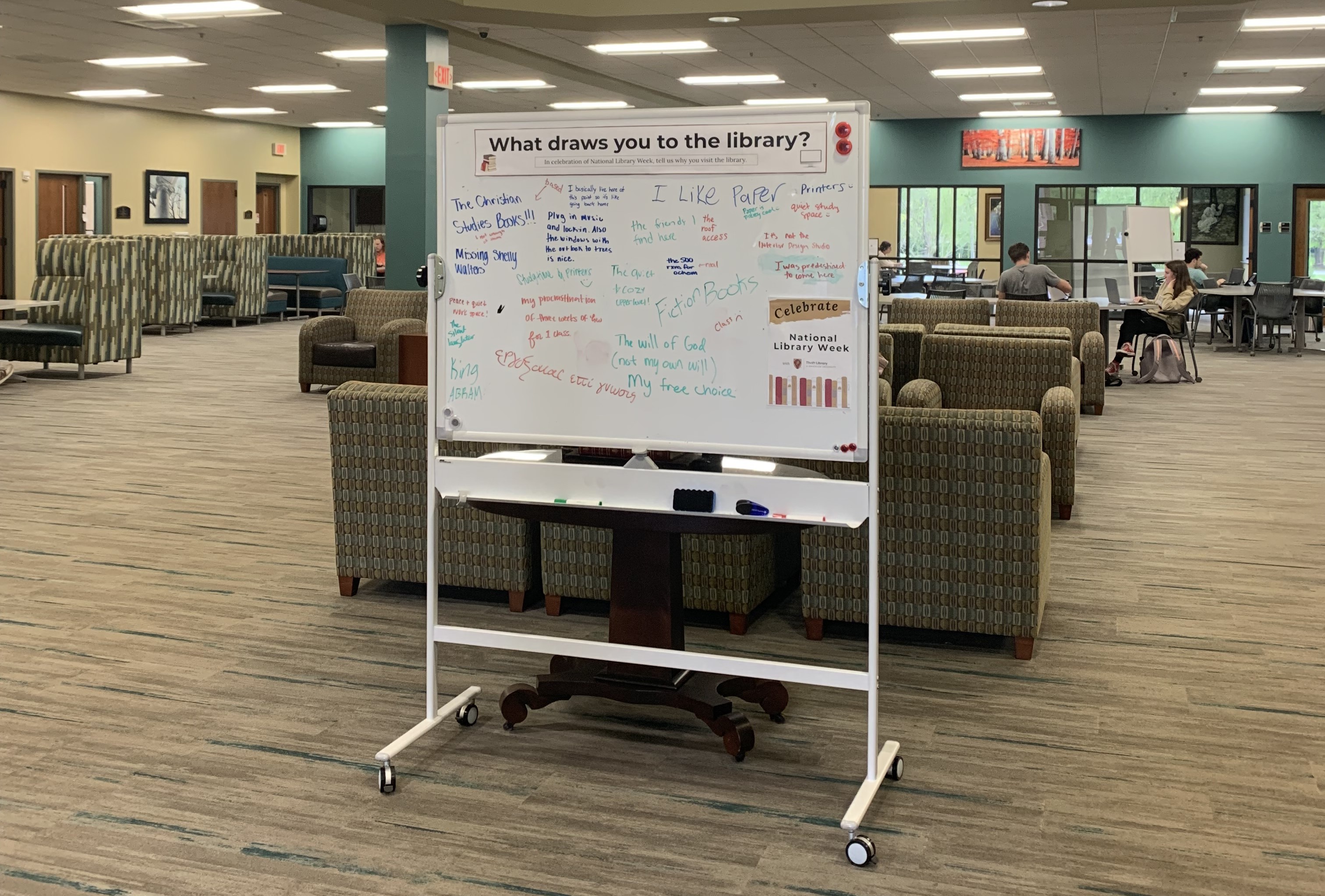 Image of whiteboard at the interior entrance of Thrift Library.